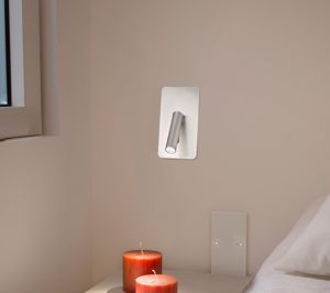 Led wall light above bedside table with adjustable arm with on-off switch